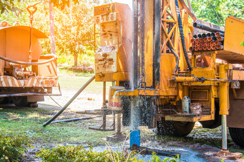 Ground,Water,Drilling,Machine,Installed,On,The,Old,Truck,In